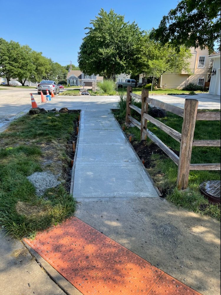 ADA-compliant concrete sidewalk with detectable warning surface — Kansas City metro