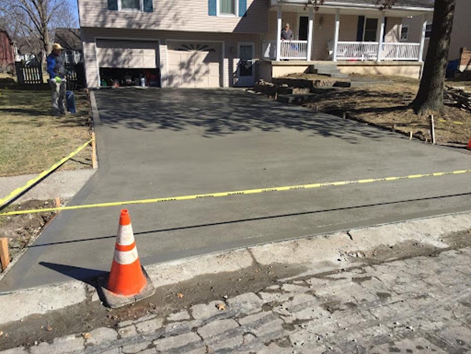 Concrete driveway replacement in progress at a residential home in Gladstone, MO